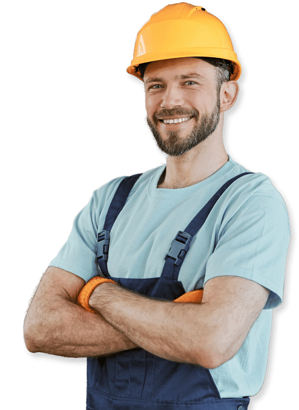 Operaio con tuta da lavoro e casco per la sicurezza giallo