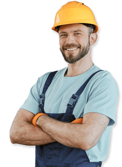 Operaio con tuta da lavoro e casco per la sicurezza giallo